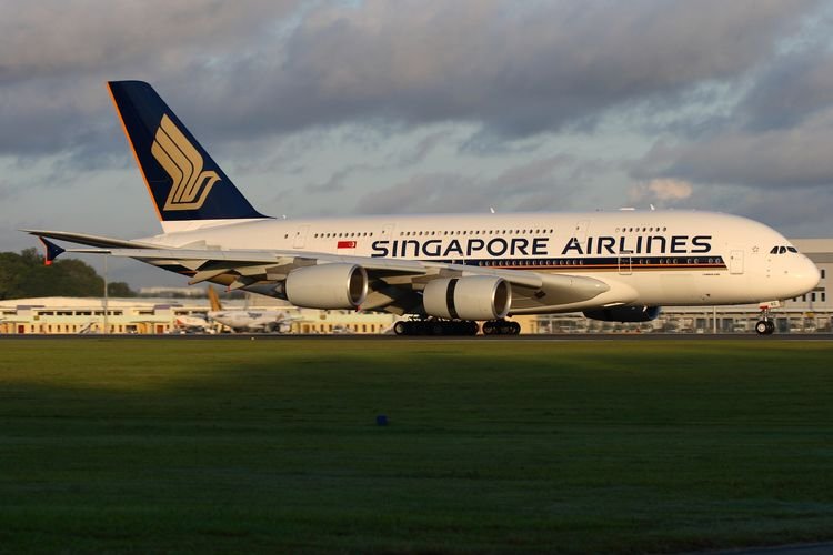 Terbang ke Singapura